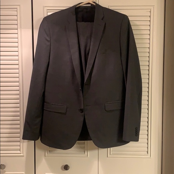 Grey pinstriped suit